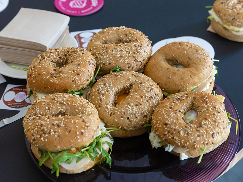 Bagel with cheese, turkey, arugula and fried egg